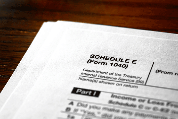 Schedule C vs Schedule E for short-term rentals
